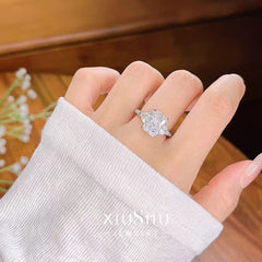 For Ken Tanner 6ct F VVS2 Three Stone Diamond Ring – Platinum with 1ct Side Stones & Pavé Setting