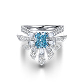 The Angel Ring-Cushion with Radiant and Round Linear Halo
