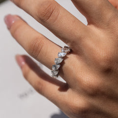 The Celestia Pear Seven-Stone Ring