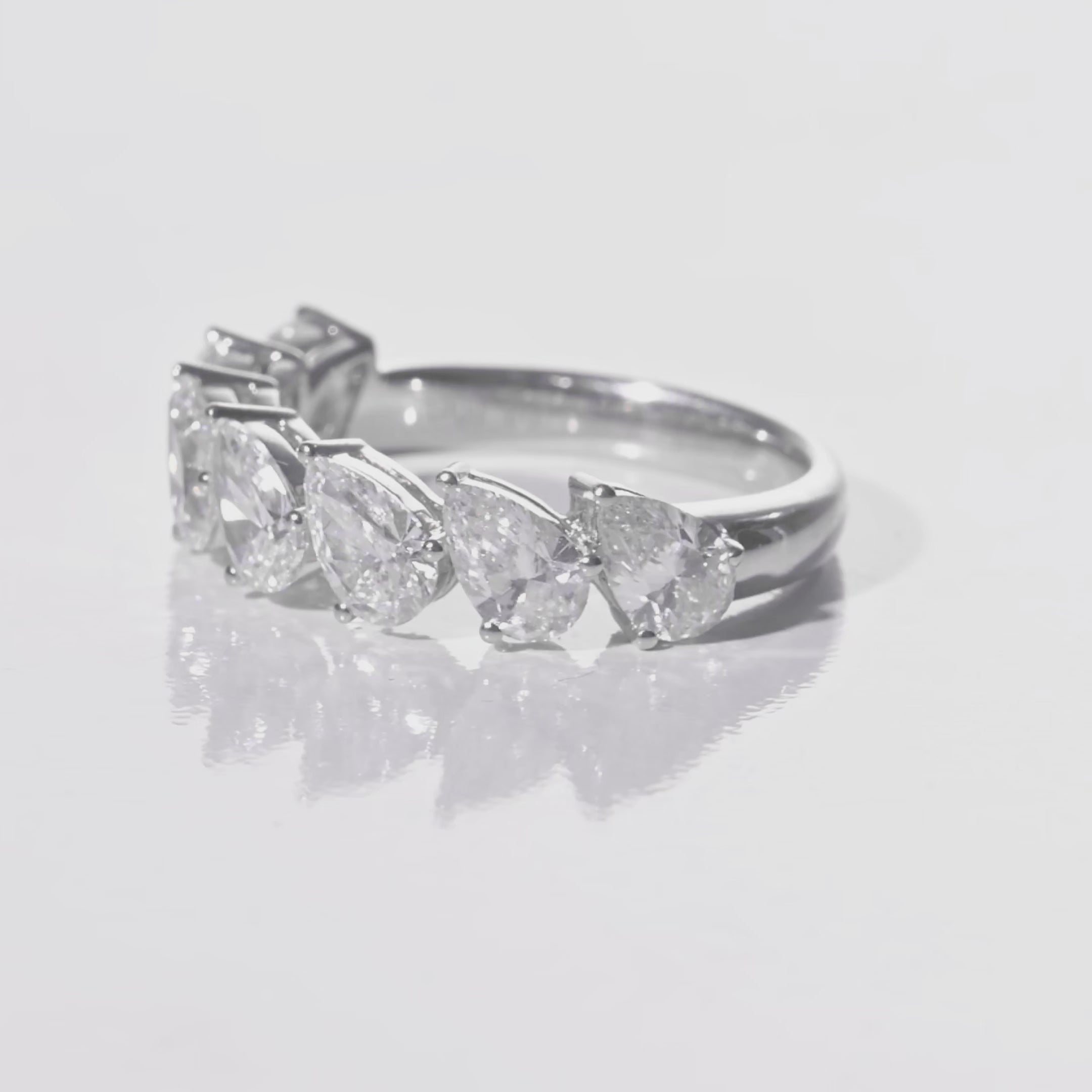 The Celestia Pear Seven-Stone Ring